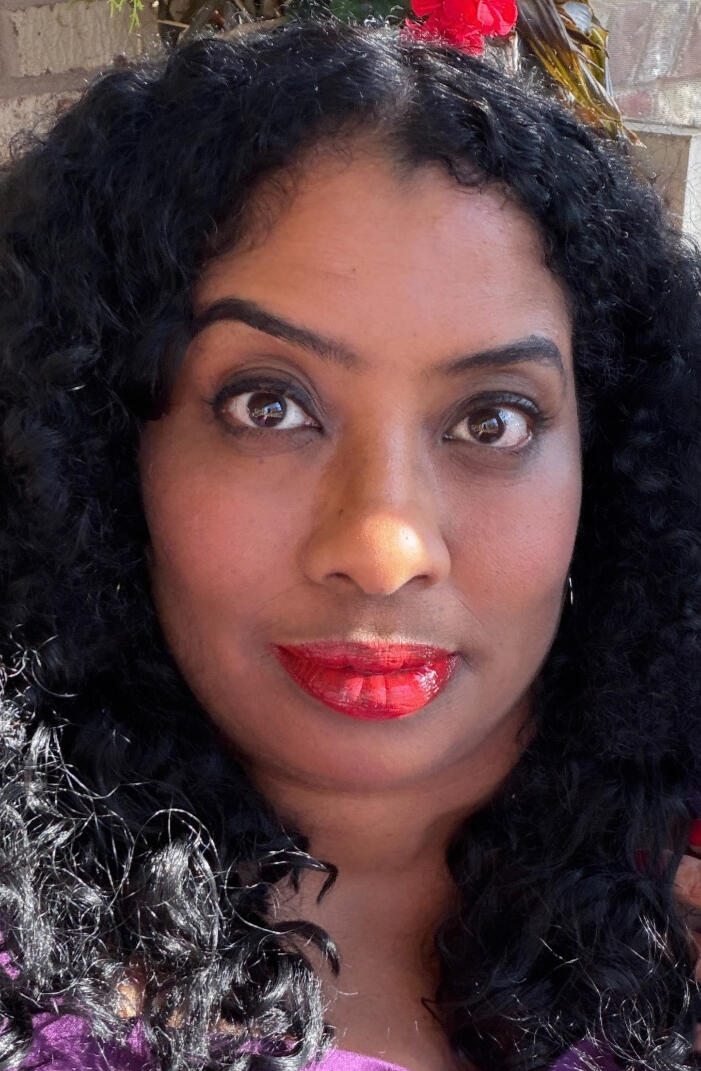 Masha Dowell | Medical Content Strategy & Healthcare Communications Expert Masha Dowell, Director of Medical Content Strategy, wearing emerald green blouse against natural background